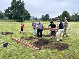 Teamwork by Troop 100 volunteers